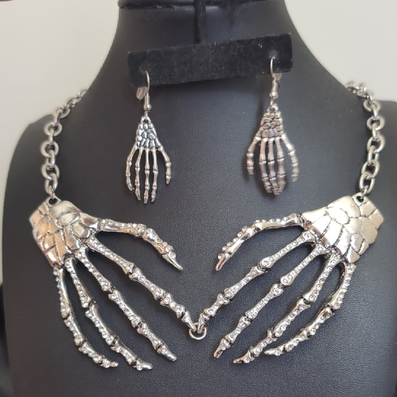 #56. NWOT "Talk Of The Town"Silver Skeleton Hand Necklace and Earring Set - Picture 1 of 1
